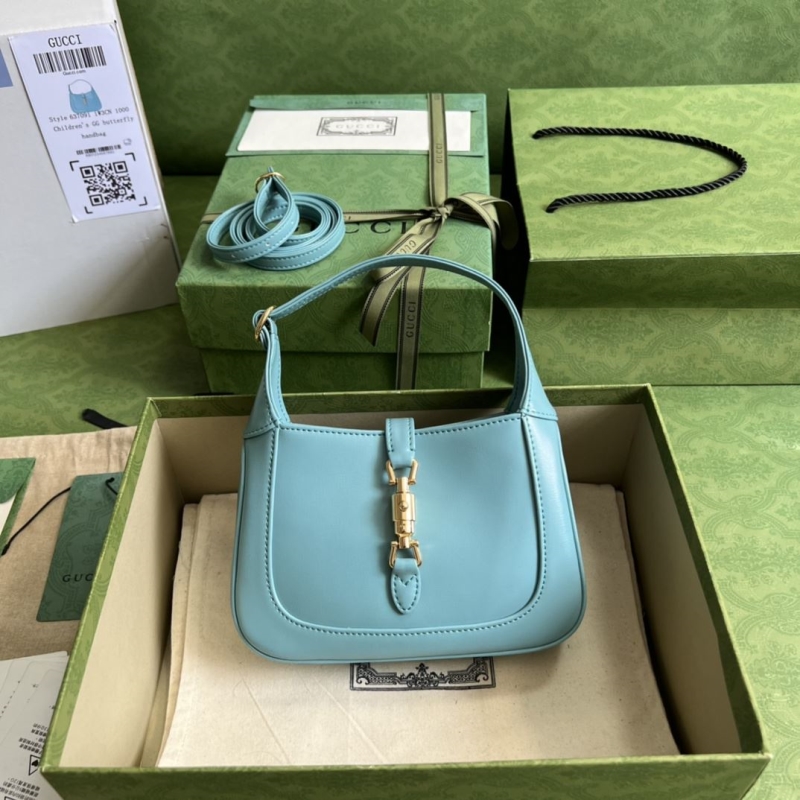 G*u*i top handle bags